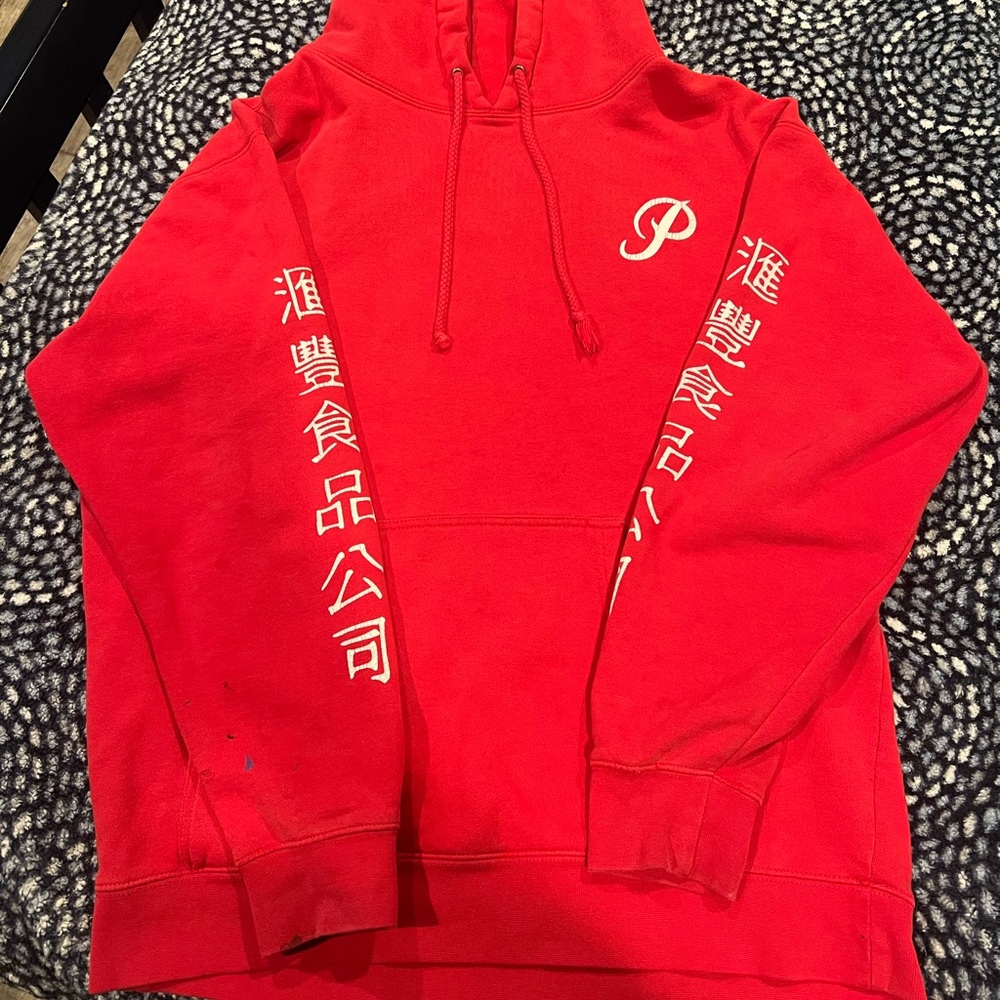 large red primitive hoodie